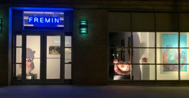 Photo of the front of Fremin Gallery at night