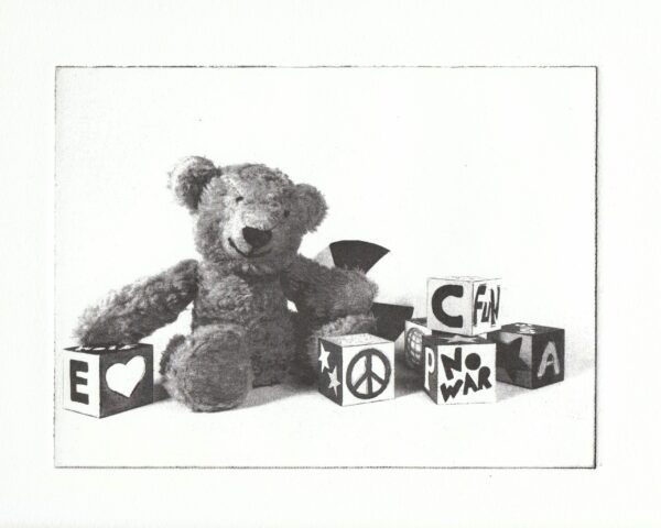 etched photograph of a teddy bear and blocks