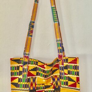 medium sized handmade cotton tote with orange African geometric designs with long shoulder straps