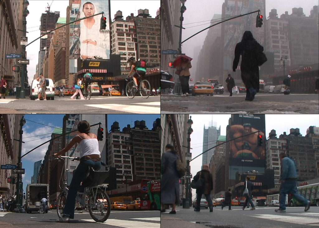 four quadrants of videos taken at different times on 8th ave and 33rd street.  Pedestrians, cyclists and cars are evident in different weathers and show different advertising murals on the wall of a building