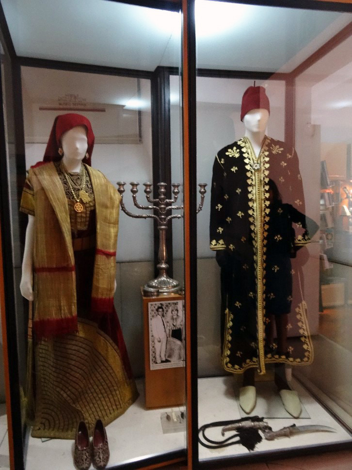 18th-century Jewish clothing and candlestick in the Jewish Museum in Toledo, Spain, where several synagogues were converted to mosques, which were converted to churches, and which are now Jewish museums