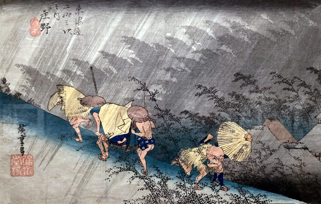 “Shono, Driving Rain” from the series “Fifty-Three Stations of the Tokaido,” 1833, color woodblock print on paper, 8 7:8 x 13 11:16 The Mary Andrews Ladd Collection